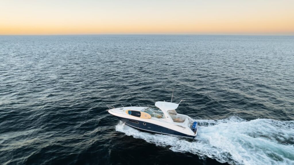 Amore 40 ft under way at sunset