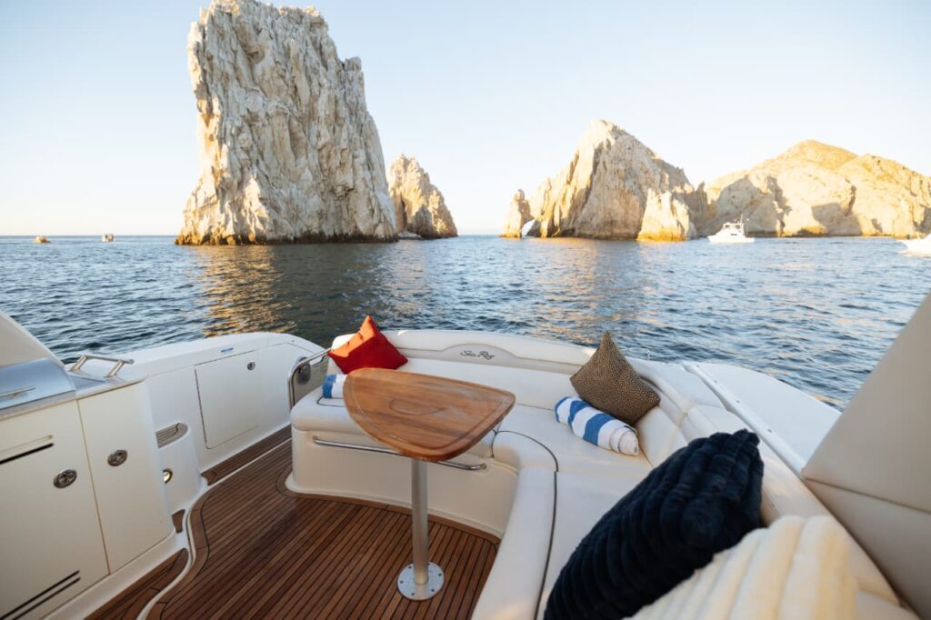 Amore 40 ft cockpit table with El Arco behind